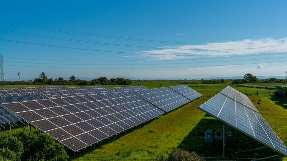 Residential home with newly installed solar panels generating clean renewable energy